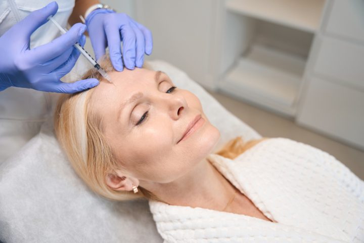 Woman having Botox to smooth wrinkles at Vedas Medical Spa & Wellness Center